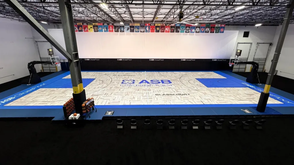 Basketball steps into the future on LED glass court at Big 12 tournament
