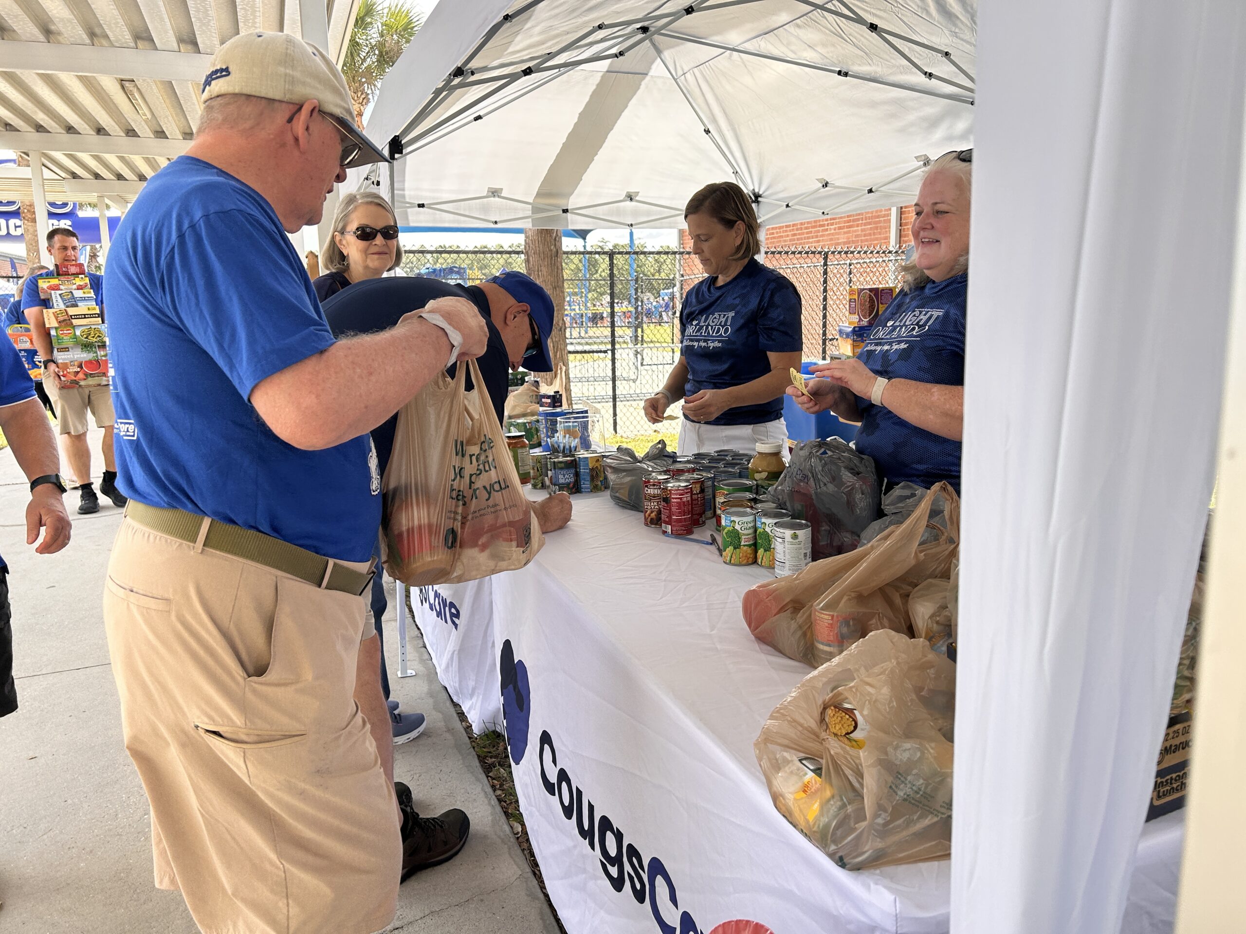 ‘An opportunity for humans to help humans’: BYU fans give back to the UCF community
